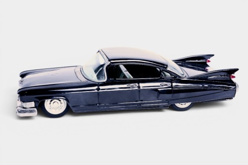 BANDAI: A c1950s Bandai (Japan) tinplate friction Cadillac sedan, 28cm long