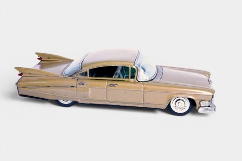 BANDAI: A c1950s Bandai (Japan) tinplate friction Cadillac sedan, 28cm long