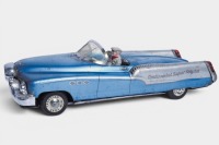 CRAGSTAN TOYS: A large c1950s Cragstan Toys (USA) tinplate friction Continental Super Special car toy with driver, 35cm long