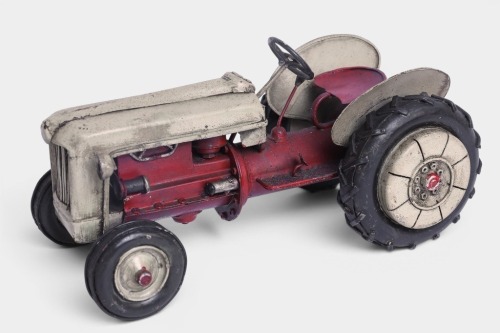 TRACTOR: A metal tractor model, 27cm long