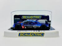 GINETTA: A 1:32 scale slot car by Scalextric of the Ginetta G60-LT-P1 with original display case [Location: Sydney]