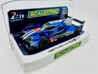 GINETTA: A 1:32 scale slot car by Scalextric of the Ginetta G60-LT-P1 with original display case [Location: Sydney] - 2
