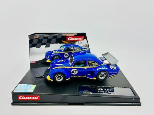 VOLKSWAGEN: A 1:32 scale slot car by Carrera of the Volkswagen Käfer Group 5 with original display case.