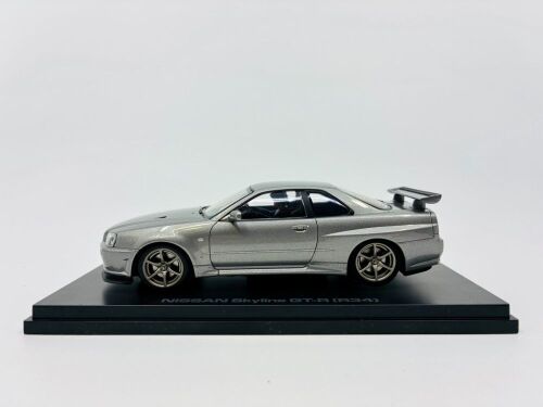 NISSAN R34 SKYLINE GTR: A 1:32 scale slot car by HPI Racing of the Nissan Skyline R34 GTR with original packaging [Location: Sydney]