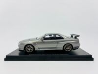 NISSAN R34 SKYLINE GTR: A 1:32 scale slot car by HPI Racing of the Nissan Skyline R34 GTR with original packaging [Location: Sydney]