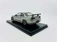 NISSAN R34 SKYLINE GTR: A 1:32 scale slot car by HPI Racing of the Nissan Skyline R34 GTR with original packaging [Location: Sydney] - 3