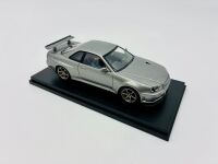 NISSAN R34 SKYLINE GTR: A 1:32 scale slot car by HPI Racing of the Nissan Skyline R34 GTR with original packaging [Location: Sydney] - 4