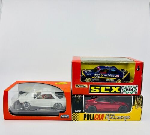 128b · SLOT CARS: Three 1:32 scale slot cars including a Nissan Skyline GTR model kit by Slot.it, a BMW E30 M3 by Matchbox/SCX and a Toyota GT86 by Policar, all in original packaging [Location: Sydney]