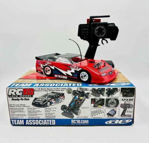 DIRT LATE MODEL: A 1:18 scale RTR electric 4WD RC car by Team Associated of a dirt late model race car with original packaging [Location: Sydney]