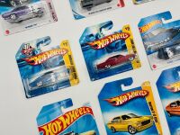 MUSCLE CARS: A group of 23 1:64 scale Hot Wheels muscle car models with a Dodge Challenger sign [Location: Sydney] - 5
