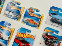MUSCLE CARS: A group of 23 1:64 scale Hot Wheels muscle car models with a Dodge Challenger sign [Location: Sydney] - 8