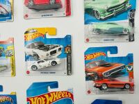 MUSCLE CARS: A group of 23 1:64 scale Hot Wheels muscle car models with a Dodge Challenger sign [Location: Sydney] - 9
