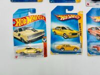 MUSCLE CARS: A group of 23 1:64 scale Hot Wheels muscle car models with a Dodge Challenger sign [Location: Sydney] - 10