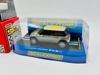 SLOT CARS: Three 1:32 scale slot cars including a BMW M3 by SCX/Matchbox, a Mini Cooper by Scalextric and a BMW 320 Group 5 kit by Sideways [Location: Sydney] - 3