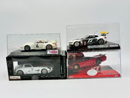 SLOT CARS: Four 1:32 scale slot cars including a BMW Z4 GT3 by Scaleauto, a Mercedes-Benz SLS GT3 by Scaleauto, a Porsche 911 993 by Spirit and a Saleen S7 [Location: Sydney]