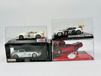 SLOT CARS: Four 1:32 scale slot cars including a BMW Z4 GT3 by Scaleauto, a Mercedes-Benz SLS GT3 by Scaleauto, a Porsche 911 993 by Spirit and a Saleen S7 [Location: Sydney]