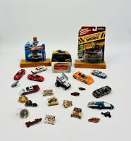 AMERICAN MOTORSPORT: A group of items featuring various forms of American motorsport including a group of 1:64 scale models and badges [Location: Sydney]