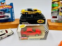 AMERICAN MOTORSPORT: A group of items featuring various forms of American motorsport including a group of 1:64 scale models and badges [Location: Sydney] - 2