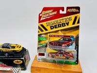 AMERICAN MOTORSPORT: A group of items featuring various forms of American motorsport including a group of 1:64 scale models and badges [Location: Sydney] - 3