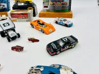 AMERICAN MOTORSPORT: A group of items featuring various forms of American motorsport including a group of 1:64 scale models and badges [Location: Sydney] - 4