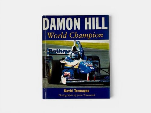 DAMON HILL WORLD CHAMPION: A hardcover book by David Tremayne, signed by Damon Hill [Location: Sydney]