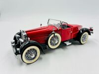 STUTZ BLACK HAWK: A 1:24 scale model by Franklin Mint of the 1928 Stutz Black Hawk Boattail Speedster [Location: Sydney] - 2