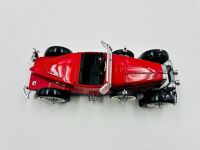 STUTZ BLACK HAWK: A 1:24 scale model by Franklin Mint of the 1928 Stutz Black Hawk Boattail Speedster [Location: Sydney] - 8