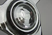 FERRARI: Two Ferrari items including a large Ferrari silk flag and a prancing horse wheel knock off. - 4