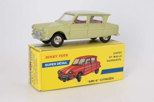 ATLAS/DINKY TOYS: 557 Citroen 'AMI 6', with windows, car mint, box faded on one side.