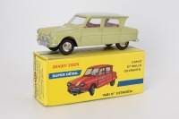 ATLAS/DINKY TOYS: 557 Citroen 'AMI 6', with windows, car mint, box faded on one side.