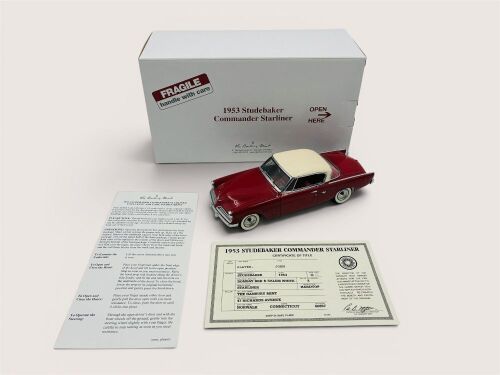 STUDEBAKER COMMANDER STARLINER: A 1:24 scale model by Danbury Mint of the 1953 Studebaker Commander Starliner [Location: Sydney]