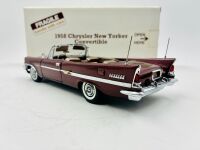 CHRYSLER NEW YORKER: A 1:24 scale model by Danbury Mint of the 1958 Chrysler New Yorker Convertible [Location: Sydney] - 4