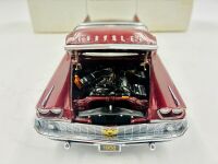 CHRYSLER NEW YORKER: A 1:24 scale model by Danbury Mint of the 1958 Chrysler New Yorker Convertible [Location: Sydney] - 11