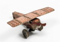 TIN AEROPLANE: A rare c1920s clockwork single prop tin aeroplane, made in Germany ( 11cm high x 24cm long x 26cm wide)