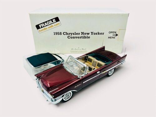 129 · CHRYSLER NEW YORKER: A 1:24 scale model by Danbury Mint of the 1958 Chrysler New Yorker Convertible [Location: Sydney]