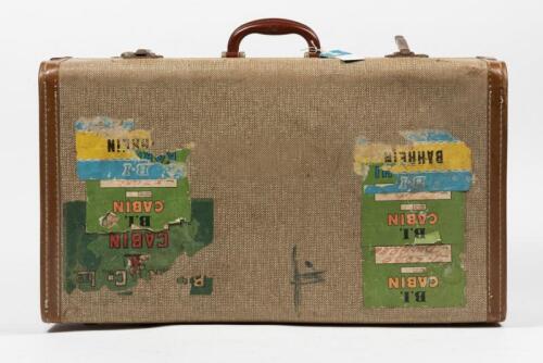 SUITCASE: A mid century suitcase with applied B.I Cabin labels, (35cm high x 60cm wide)