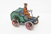 LEHMANN: A circa early 1900s Lehmann (Germany) clockwork tin toy, features a uniformed driver atop early veteran car marked 'OHO' - 3