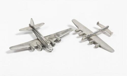 BOMBERS: Two large cast metal aeroplane, one being the Lancaster Bomber, 22.5cm wide