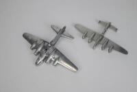 BOMBERS: Two large cast metal aeroplane, one being the Lancaster Bomber, 22.5cm wide - 2
