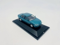 FORD: A 1:43 scale model by Paradise Garage of the Ford EF Falcon Futura in Reef Green Metallic, complete with original packaging - 6