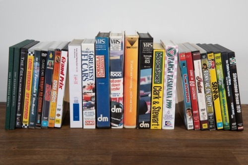 644 · DVD / VHS: A collection of assorted DVD and VHS tapes mostly relating to motor racing