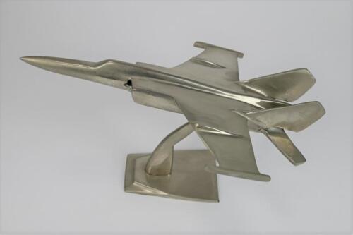 DESK PIECE: A large modern cast metal model of a 1980s fighter bomber (19cm long by 31cm wide)