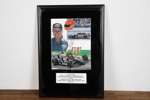 A.J. FOYT: An Anthony Joseph Foyt signed display piece, 46cm high, 32cm wide