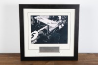 BRABHAM BT26A: A b/w photograph featuring Sir Jack sitting in a BT26A in 1969 giving Ron Tauranac feedback, hand signed by Sir Jack and Ron Tauranac