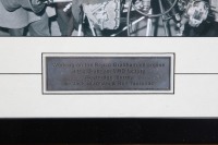 BRABHAM: A b/w photograph featuring Sir Jack & Ron Tauranac both working on the Repco-Brabham V8 engine, hand signed by Sir Jack and Ron Tauranac - 2