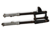 NORTON: A pair of Norton roadholder forks with headlamp brackets with brass roadholder plates attached [Location: Melbourne] - 2