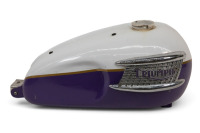 TRIUMPH: A Triumph fuel tank, thought to suit an early unit construction model, with harmonica badges [Location: Melbourne]