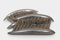 TRIUMPH: A pair of Triumph 'harmonica' tank badges [Location: Melbourne]