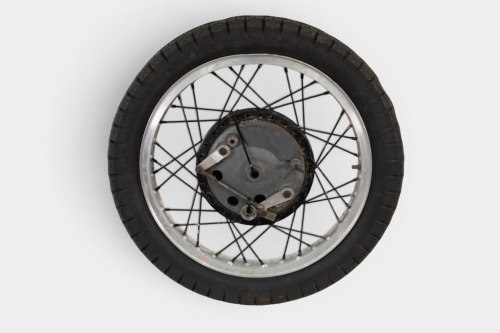 OLDANI MILANO: An Oldani Milano magnesium racing front wheel with brake anchor, twin leading shoe, Borrani 18 inch alloy rim