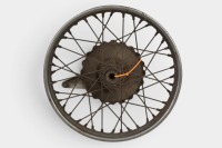 TRIUMPH: A Triumph circa early 1950s Tiger 100 wheel with 'piecrust hub' and 'S' scoop front brake, 19 inch wheel [Location: Melbourne] - 2
